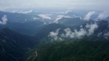 Experience the Serene and Tranquil Mountain Landscape Filled with Lush Greenery and Scenic Clouds. Stock Clip video