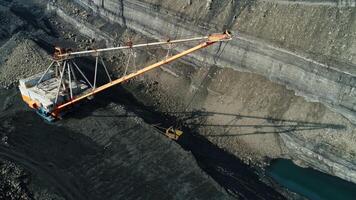 Aerial Perspective of Large Heavy Machinery Working in an OpenPit Mining Operation Site. Stock Clip video