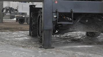 Construction Equipment operating on a Wet Surface during building projects and tasks. Clip video