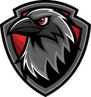 A raven head on a shield with red eyes vector
