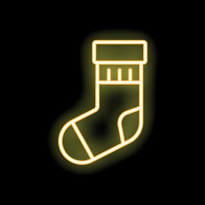 Neon yellow christmas stocking shining in the dark
