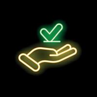 Neon sign of hand holding check mark symbol on black background vector
