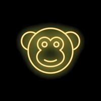 Yellow neon sign monkey face smiling on black background vector