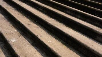 Motion over weathered concrete staircase with wide steps video