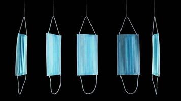 Line of contemporary protective masks turning on threads video