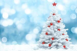 A Winter Wonderland A Snowy Christmas Tree with Red Ornaments, Against a Sparkling Blue Sky photo