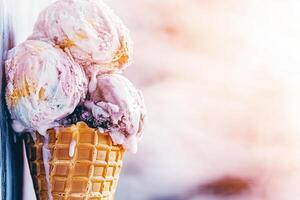 Dreamy Frosted Ice Cream Cone Dripping with Sweet Indulgence photo