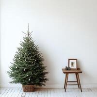 A beautifully decorated Christmas tree stands beside a simple table in a modern living room photo