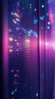 A vibrant display of colorful lights illuminating a data center corridor at night photo