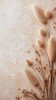 Dry flowers arranged elegantly on a textured surface with subtle colors and patterns photo