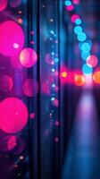A vibrant display of colorful lights illuminating a data center corridor at night photo