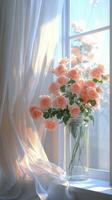 Soft pink roses beside a bright window with blooming flowers visible on a sunny day photo
