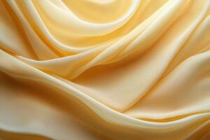 Soft orange fabric flowing with warm sunlight creating dynamic patterns on a wall photo