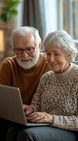 Elderly couple enjoys time together while using a laptop in a cozy indoor setting photo