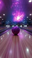 Bowling ball rolls towards pins in a bowling alley during a weekend outing photo