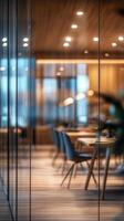 A modern office interior setup featuring stylish chairs and warm ambient lighting in the evening photo