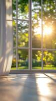 Sunlight streaming through a window onto a wooden floor in a serene garden setting photo
