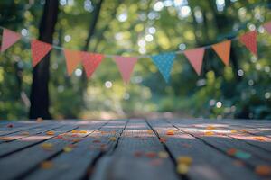 Decorative flags hang above a wooden deck with colorful confetti in a vibrant forest setting photo