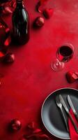 Romantic dining setup with red decor, wine, and a plate ready for a special occasion photo