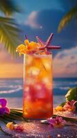 Colorful tropical cocktail garnished with a starfish on a beach during sunset photo