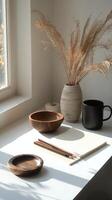 Cozy dining setup with wooden tableware and decorative vase in sunlit kitchen photo