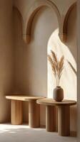 Elegant wooden bowls on textured pedestals in a warm, minimalistic interior design setting photo