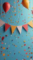 Colorful party decorations and confetti create a festive atmosphere on a clear blue day photo