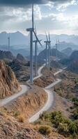 Sunrise over a mountain landscape with wind turbines in a serene valley vista photo