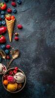 Fresh berries overflowing from a waffle cone on a dark textured surface with mint leaves photo