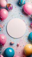 Balloons and confetti frame a blank space for a celebration invitation or greeting card photo