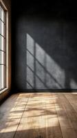Sunlight casting shadows in a rustic room with wooden flooring and a large window photo