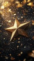 A golden star resting on a bed of glittering particles with a soft glowing background photo