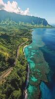 Aerial view of a coastal landscape with lush mountains and clear waters during daylight photo