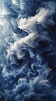 Swirling clouds of mist in shades of blue and white during twilight by a calm surface photo