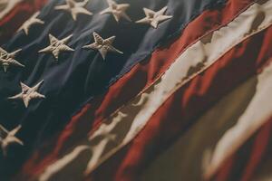 Waving American flag against a clear blue sky symbolizing national pride and unity photo