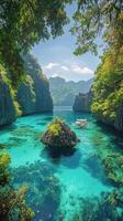 Serene turquoise water surrounded by lush greenery and mountains on a bright sunny day photo