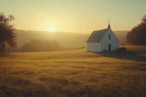 A solitary white house stands in a golden field under a dramatic sky at sunset photo