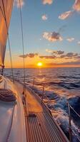 Sailing into the sunset over tranquil waters with colorful reflections photo
