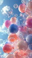 Colorful balloons and bubbles float in a clear blue sky during a sunny day photo