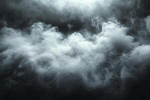 Thick white smoke drifts over a dark background, creating a mysterious surreal atmosphere photo