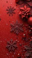 Festive red background with gold and black snowflake patterns during the holiday season photo