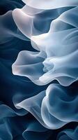 Swirling clouds of mist in shades of blue and white during twilight by a calm surface photo