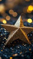 A golden star resting on a bed of glittering particles with a soft glowing background photo