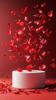 Floating rose petals cascade over a circular pedestal against a pink background photo