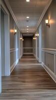 Elegant corridor with stylish lighting and wooden flooring in a modern home photo