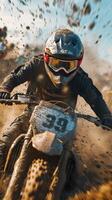 Motorcycle rider navigating through muddy terrain during an off road competition in autumn photo