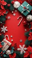 Festive holiday decorations with presents and candy canes on a vibrant red background photo