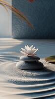 Calm waters with a blooming lotus flower on stacked stones in a serene natural setting photo