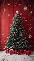 Christmas tree adorned with red ornaments and wrapped gifts in a festive setting photo