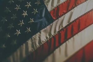 Waving American flag against a clear blue sky symbolizing national pride and unity photo
